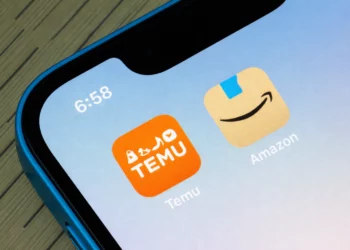 South African online shoppers using mobile phones and laptops as regulators push new e-commerce accountability rules for major platforms