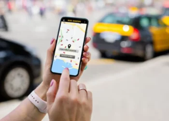 South African e-hailing vehicle refuelling at a petrol station as new fuel levies and higher pump-price pressure loom