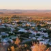 Wide view of the Middelpos village streetscape in the Upper Karoo, Northern Cape, showing historic low-rise Karoo architecture against a semi-desert landscape.