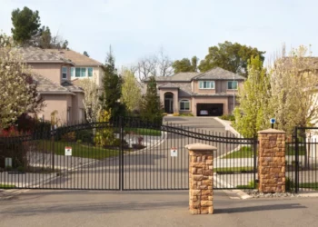 A gated community entrance in South Africa, illustrating new High Court scrutiny of levy recovery and legal costs in community schemes.