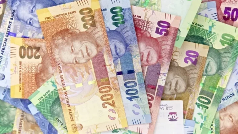 South African rand notes and a rate chart illustrating growing pressure on South Africa’s interest rate outlook.