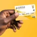 Pensioner drawing a SASSA grant payment at a supermarket till point in South Africa