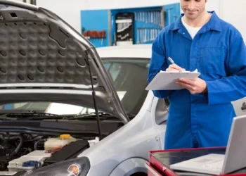 Vehicle on a hoist at a South African roadworthy testing station during inspection