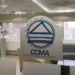 A worker filling in a CCMA referral form at a labour office counter
