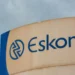 Eskom transformer and power lines above houses in a Gauteng township at dusk