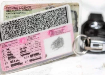A South African driving licence card on a testing centre counter as the driving licence renewal fee comes under review