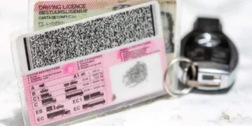 A South African driving licence card on a testing centre counter as the driving licence renewal fee comes under review