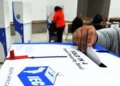 Ballot boxes at a South African voting station as parties audit the system behind local election results